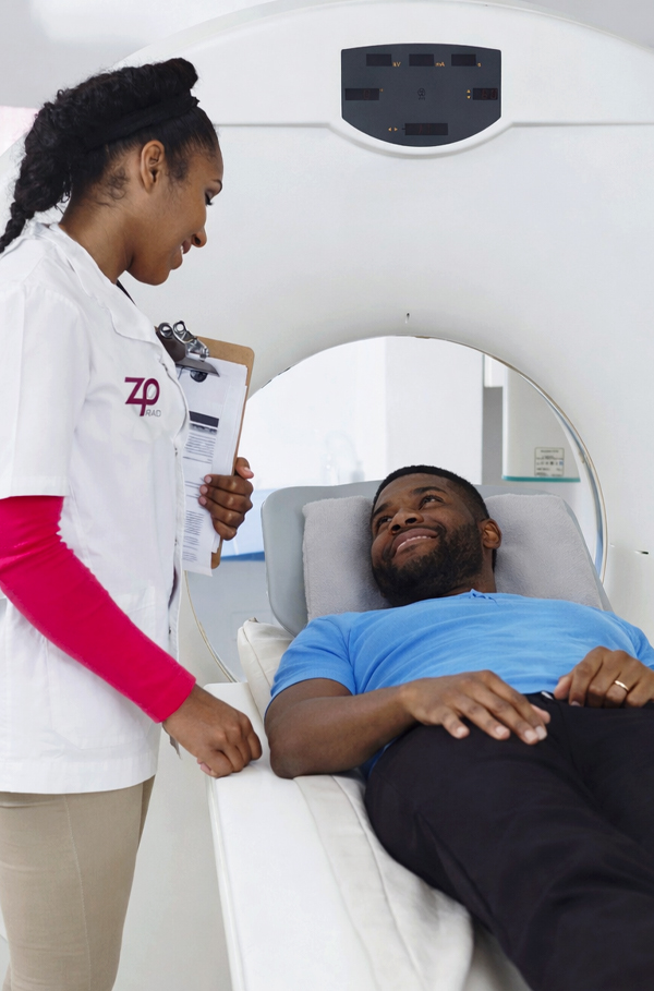 CT technologist and patient at Zwanger-Pesiri