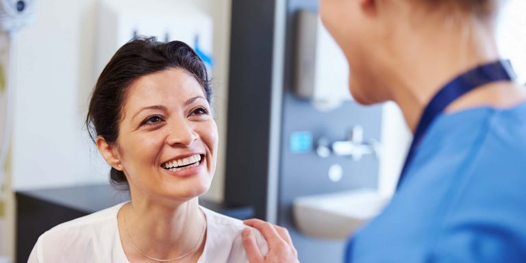 Doctor talking with patient