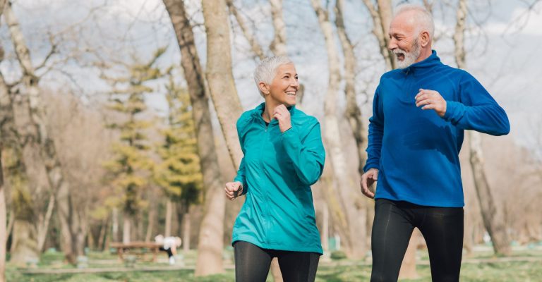 Older couple jogging