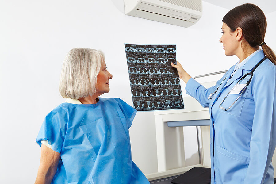 doctor and patient reviewing dexa scan